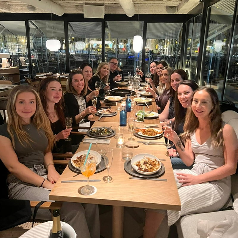 A team having dinner in a restaurant